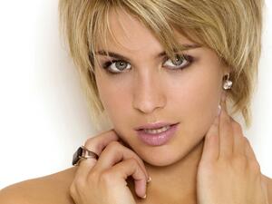 The English actress, television personality and glamour and lingerie model politely declined the sheik's marriage proposal/purchase. (Facebook) 