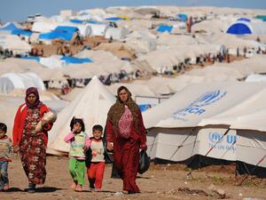 Motherhood is especially difficult during times of war. (AFP/Bulent Kilic)