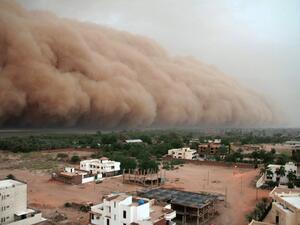 A haboob, similar to the one that swept over small-town Lubbock, Texas on Sunday, is seen over Khartoum. Intense dust storms caused by downward-flowing winds from thunderstorms, haboobs are common in the American southwest and parts of the Middle East.  (AFP/File).  