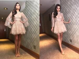 تألقت هاندا أرتشيل بفستان كريمي مع مكياج ناعم أبرز جمال ملامحها