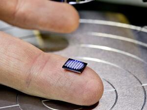 The chip is so tiny you’ll need a microscope to see it. (Photo: IBM)