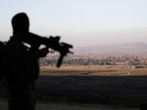 An Israeli soldier is stationed near the Israeli-Syrian border, August 2015.  (AFP/File)