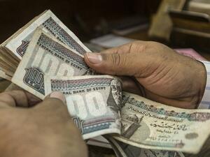 Egypt has been struggling to boost its foreign currency reserves in the political and economic turmoil following the January 2011 uprising that toppled former president Hosni Mubarak. (AFP/ Khaled Desouki)