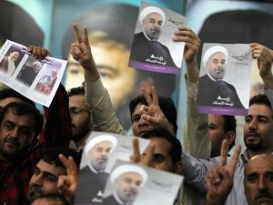 Iranian supporters of President-elect Hassan Rouhani gather at the mausoleum of the founder of Iran's Islamic Republic Ayatollah Ruhollah Khomeini (Atta Kenare / AFP)