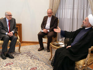 Iranian President Hassan Rouhani (R) meets with International Peace envoy to Syria Lakhdar Brahimi (L) in Tehran on October 27, 2013.(Image credit: AFP)