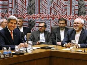 US Secretary of State John Kerry, Iranian Foreign Minister Mohammad Javad Zarif, deputy Iranian negotiators Majid Ravanchi and Abbas Araghchi seated between them against the wall at a meeting in New York in September. [AFP]