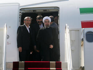 President Rouhani has been greeted by supporters and hardliners after returning to Iran from the U.N. General Assembly session in New York. (Image credit: AFP)