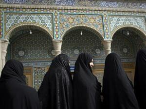 No more all-black look for these women: the "Practical Hejab Products" exhibition in Tehran showed off chadors in a range of colorful patterns.  (AFP/File)