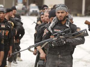 عناصر مسلحة من مليشياالحشد الشعبي الشيعية