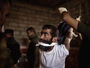 مصور رافق القوات العراقية بالموصل يكشف فظائع "مخيفة" 