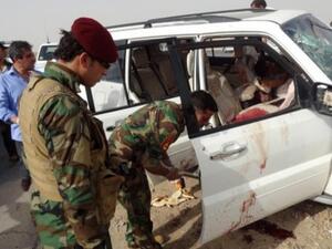 شرطة عراقية تفتش سيارة في كركوك/أ.ف.ب