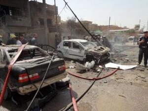 سيارات مدمرة اثر تفجير في كركوك/أ.ف.ب