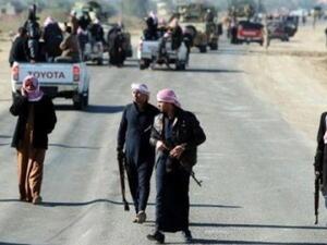 صورة يتداولها نشطاء على الانترنت عن الاشتباكات بين القوات النظامية ورجال العشائر في الحويجة