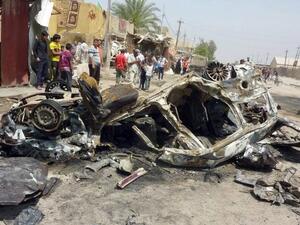 Aftermath of a car bombing in al-Obaidi neighborhood, east of Baghdad (AFP/ Ali Al-Saadi)