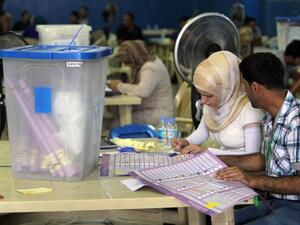 Iraqi Prime Minister Nouri al-Maliki's coalition came top in provincial elections held two weeks ago, according to results released on Saturday. (AFP PHOTO/AHMAD AL-RUBAYE)