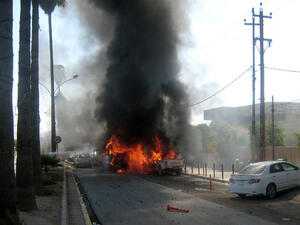 Flames rise from the site of a car bomb attack in the northern Iraqi city of Kirkuk. (Image Credit: AFP)