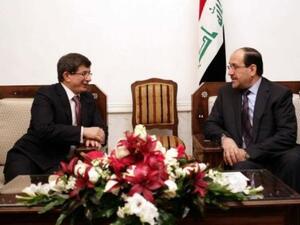 اوغلو خلال لقائه مع المالكي