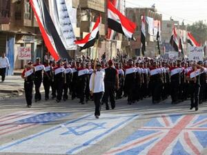 على وقع هتافي "كلا كلا امريكا" و"كلا كلا اسرائيل" سار الآلاف من مؤيدي الزعيم الشيعي الشاب وسط مدينة الصدر