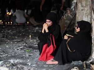Iraqi women mourn the Karada suicide attack, days before another attack killed almost two dozen north of Baghdad. (AFP/Ahmad al-Rubaye) Iraqi women mourn the Karada suicide attack, days before another attack killed almost two dozen north of Baghdad. (AFP/Ahmad al-Rubaye)