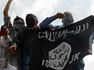 Young boys with ISIS flag (AFP/File Photo)	