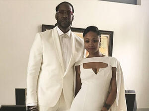 The couple said their vows in front of a white tiger (source: getnaudi / Instagram )