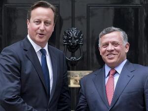 British Prime Minister David Cameron (L) greets Jordan's King Abdullah II at Number 10 Downing Street in central London on June 19 (Justin Tallis / AFP)