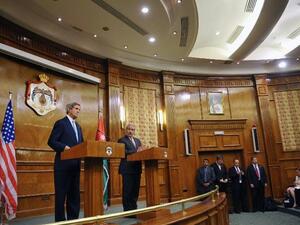 US Secretary of State John Kerry and Jordan's Foreign Minister Nasser give a joint press conference on July 17, 2013 at the Ministry of Foreign Affairs in the Jordanian capital, Amman. AFP PHOTO POOL MANDEL NGAN