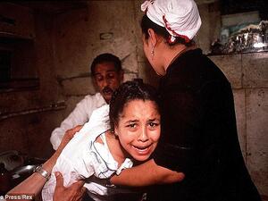 Up to 92 per cent of married women in Egypt have undergone female genital mutilation, it has been revealed. A young girl is pictured above undergoing FGM in Egypt in 1987. (Daily Mail)