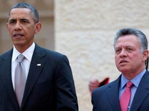 President Barack Obama of the U.S. stands shoulder to shoulder with Jordan's King Abdullah II