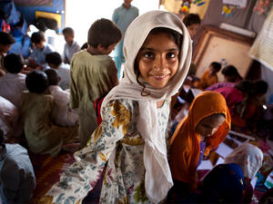 Children play at the Child Friendly Space funded by Trócaire on the outskirts of Hyderabad, southern Pakistan. The Child Friendly Space offers a place for children left homeless by last year's floods to play and learn. (Photo: Luca Tommasini / Trócaire).