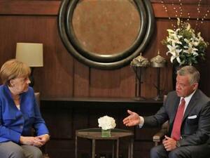 Jordan's King Abdullah II and German Chancellor Angela Merkel. (File/Photo)