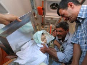 دفن الطفل السوري الغريق وأخيه ووالدته في كوباني
