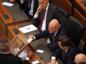 Lebanese MPs seen casting ballots in a parliamentary session. (AFP/File)