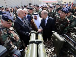 Lebanese Army chief Jean General Jean Kahwaji, Lebanese Defence Minister Samir Moqbel, Saudi Ambassador to Lebanon Ali Awad Asiri and French Defence minister Jean-Yves Le Drian at the hand-over ceremony of a shipment of French weapons to the Lebanese Army in Beirut. (Image: AFP/Joseph Eid)