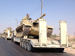 Egyptian military tanks are deployed in the northern Sinai town of Al-Arish (AFP/STR)