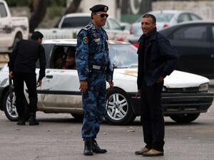 Libyan security forces monitor a protest in Benghazi. (AFP/Abdullah Doma) Libyan security forces monitor a protest in Benghazi. (AFP/Abdullah Doma)
