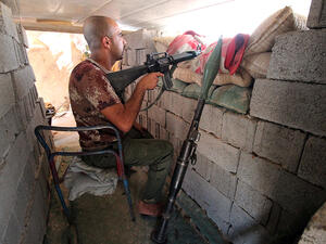 A member of the Iraqi forces guards a look-out point during clashes with Daesh in the province of Anbar, August 2015. (AFP/Haidar Mohammed Ali)
