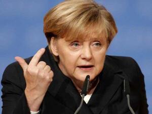 ترامب يكشف بنفسه سر عدم مصافحته ميركل
