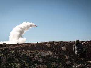 Syrian rebels launch a missile near the Abu Baker brigade in Albab, 30 kilometres from the northeastern Syrian city of Aleppo, on Wednesday. 
