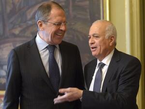Russian Foreign Minister Sergei Lavrov (L) speaks with Arab League chief Nabil al-Arabi before the start of a Russian-Arab League meeting in Moscow. (AFP PHOTO / POOL)