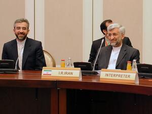 Iran's representatives led by their top nuclear negotiator Saeed Jalili (R) take part in talks with top officials from the United States, Britain, France, EU, China, Germany and Russia on Iran's nuclear program. (AFP PHOTO /ILYAS OMAROV)