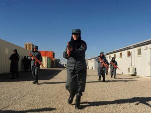 Afghanistan National Police during a training exercise at a police academy outside Herat on Christmas Day. (AFP PHOTO/ AREF KARIMI)