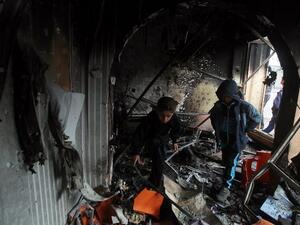 Iraqi children inspect a building in the aftermath of a car bomb in the the mainly Shiite Hurriyah neighbourhood of Baghdad, on Wednesday. (AFP PHOTO / AHMAD AL-RUBAY)