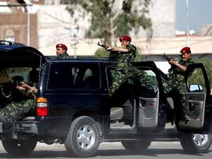 Soldiers of the Republican Guard show off their skills during the graduation ceremony for the first batch of a Personal Protection Battalion in the Yemeni capital Sanaa, on Sunday. (AFP PHOTO/ MOHAMMED HUWAIS)