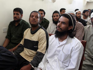 Suspected al-Qaeda militants attend their trial at a state security court in Sana'a on Tuesday. Photo for illustration purposes only. (Mohammed Huwais/AFP)
