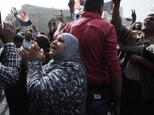 Egyptian women shout slogans against President Mohamed Morsi's government at Tahrir square. (AFP PHOTO/GIANLUIGI GUERCIA)