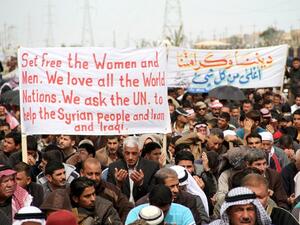 Iraqi protestors gather during a demonstration in the city of Samarra on March 8, 2013. Protestors have taken to the streets in Sunni-majority areas for more than two months, calling for the resignation of Prime Minister Nouri al-Maliki. (AFP PHOTO / MAHMOUD AL-SAMARRAI)