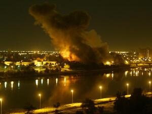 File picture dated March 20, 2003 shows smoke billowing after a missile hit the planning ministry in Baghdad as the Iraqi capital came under heavy US-led bombardment on the first day of the US-led invasion of Iraq that toppled Saddam Hussein. (AFP PHOTO/Ramzi HAIDAR)