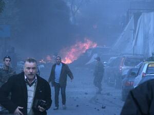 Beirut : Fire is seen at the site of a car bomb explosion that rocked central Beirut on December 27, 2013. [AFP]
