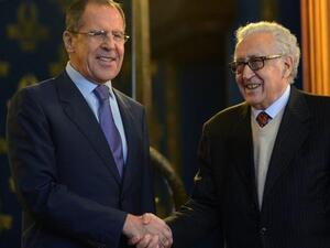 Russian Foreign Minister Sergei Lavrov (L) shakes hands with UN-Arab League peace envoy Lakhdar Brahimi as they arrive for talks in Moscow, on Saturday. (AFP PHOTO / KIRILL KUDRYAVTSEV)